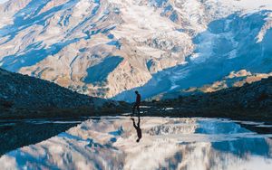 Preview wallpaper mountain, silhouette, reflection, sky, solitude