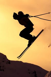 Preview wallpaper mountain skiing, jump, silhouette, extreme, snow