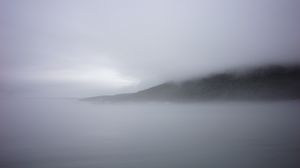 Preview wallpaper mountain, slope, fog, sea, nature