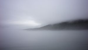 Preview wallpaper mountain, slope, fog, sea, nature