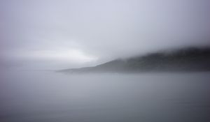 Preview wallpaper mountain, slope, fog, sea, nature