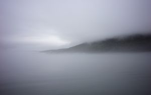 Preview wallpaper mountain, slope, fog, sea, nature