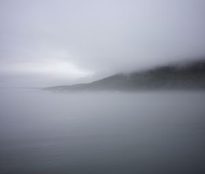 Preview wallpaper mountain, slope, fog, sea, nature