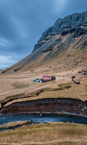 Preview wallpaper mountain, slope, house, river, nature