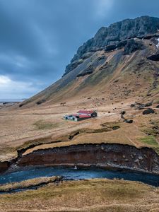Preview wallpaper mountain, slope, house, river, nature