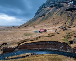 Preview wallpaper mountain, slope, house, river, nature