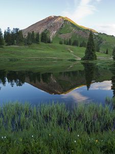 Preview wallpaper mountain, slope, lake, valley, trees