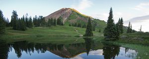 Preview wallpaper mountain, slope, lake, valley, trees