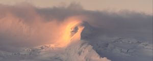 Preview wallpaper mountain, slope, relief, snow, sunrise