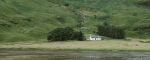 Preview wallpaper mountain, slope, river, house, grass