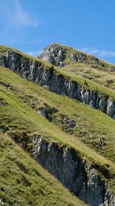 Preview wallpaper mountain, slope, rocks, grass, nature