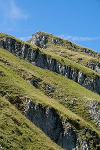 Preview wallpaper mountain, slope, rocks, grass, nature