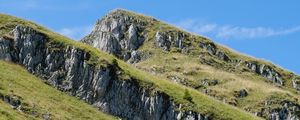 Preview wallpaper mountain, slope, rocks, grass, nature