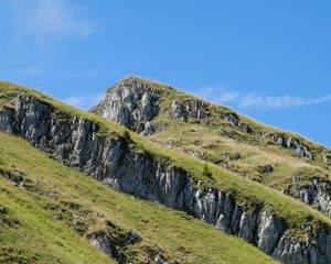 Preview wallpaper mountain, slope, rocks, grass, nature