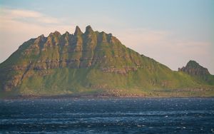 Preview wallpaper mountain, slope, sea, stones, nature