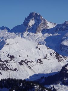 Preview wallpaper mountain, slope, snow, shadows, nature