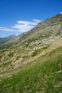 Preview wallpaper mountain, slope, stones, grass, nature, landscape