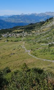 Preview wallpaper mountain, slope, valley, path, houses, landscape