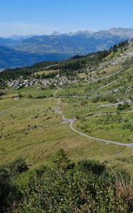 Preview wallpaper mountain, slope, valley, path, houses, landscape