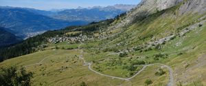 Preview wallpaper mountain, slope, valley, path, houses, landscape