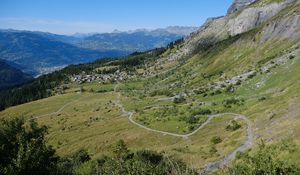 Preview wallpaper mountain, slope, valley, path, houses, landscape