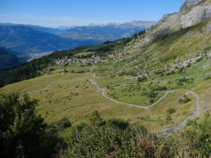 Preview wallpaper mountain, slope, valley, path, houses, landscape