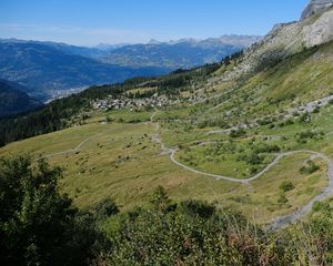 Preview wallpaper mountain, slope, valley, path, houses, landscape