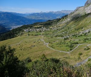 Preview wallpaper mountain, slope, valley, path, houses, landscape