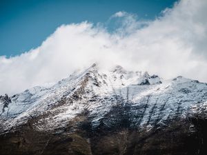 Preview wallpaper mountain, snow, clouds, sky, white, landscape