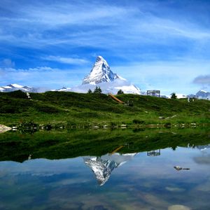 Preview wallpaper mountain, snow, coast, river, reflection, nature