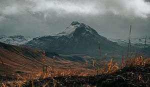 Preview wallpaper mountain, snow, grass, landscape, nature