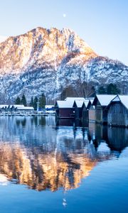 Preview wallpaper mountain, snow, lake, houses, reflection, landscape