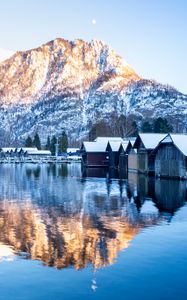 Preview wallpaper mountain, snow, lake, houses, reflection, landscape
