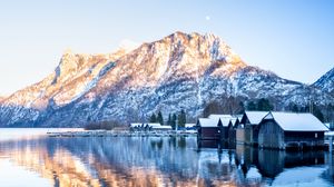 Preview wallpaper mountain, snow, lake, houses, reflection, landscape