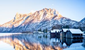 Preview wallpaper mountain, snow, lake, houses, reflection, landscape