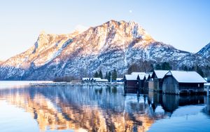 Preview wallpaper mountain, snow, lake, houses, reflection, landscape
