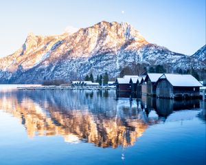 Preview wallpaper mountain, snow, lake, houses, reflection, landscape