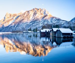 Preview wallpaper mountain, snow, lake, houses, reflection, landscape