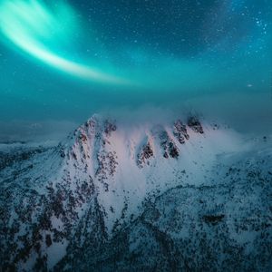 Preview wallpaper mountain, snow, northern lights, night, winter