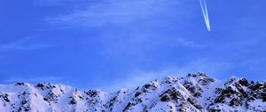 Preview wallpaper mountain, snow, plane, sky, snowy, flight, peak