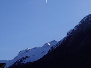 Preview wallpaper mountain, snow, plane, trail, nature