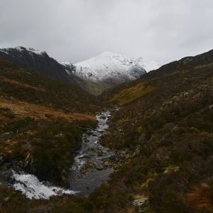 Preview wallpaper mountain, snow, slopes, stream