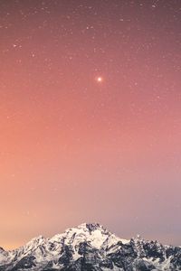Preview wallpaper mountain, snow, starry sky, peak, night