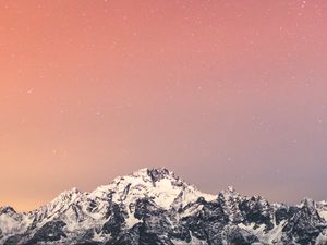 Preview wallpaper mountain, snow, starry sky, peak, night