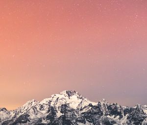 Preview wallpaper mountain, snow, starry sky, peak, night