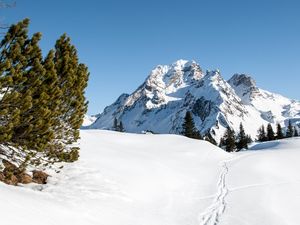 Preview wallpaper mountain, snow, traces, path, winter, landscape