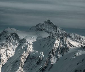 Preview wallpaper mountain, snowy, snow, winter, peaks, sky