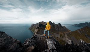 Preview wallpaper mountain, solitude, man, peak, norway