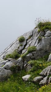 Preview wallpaper mountain, stones, grass, nature