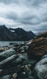 Preview wallpaper mountain, stones, water, lake, fog, overcast